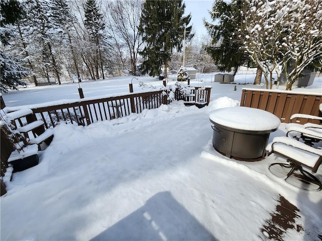 view of snow covered deck