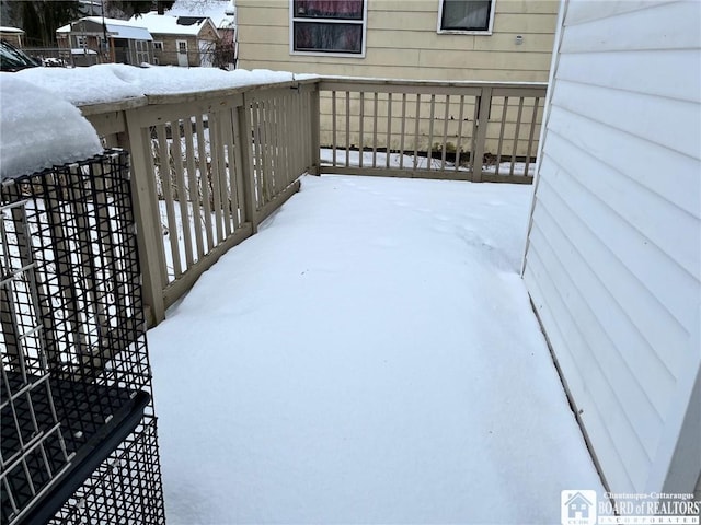 view of snow covered deck