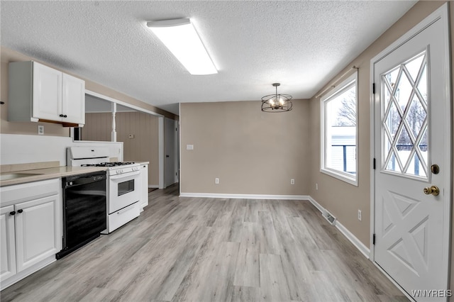 kitchen with black dishwasher, white gas range, decorative light fixtures, and white cabinets