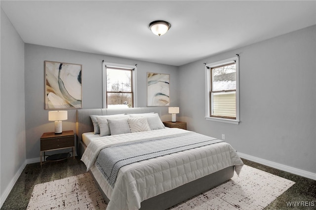 bedroom featuring multiple windows