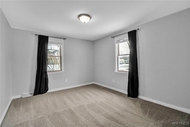 view of carpeted spare room