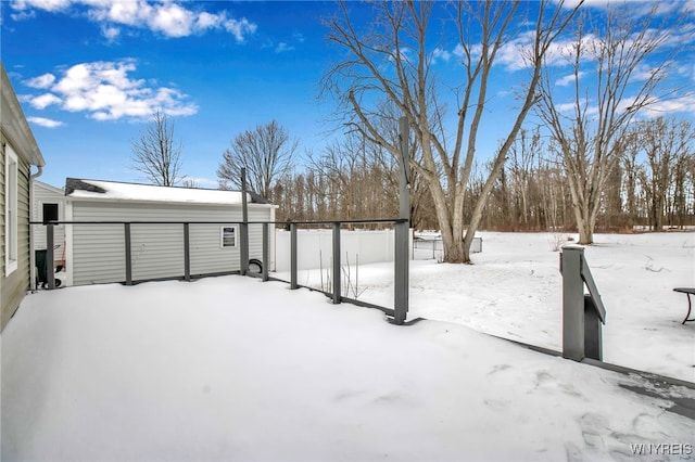 view of yard covered in snow