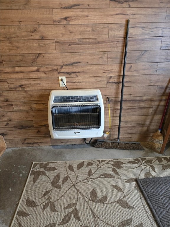 details with heating unit and wood walls