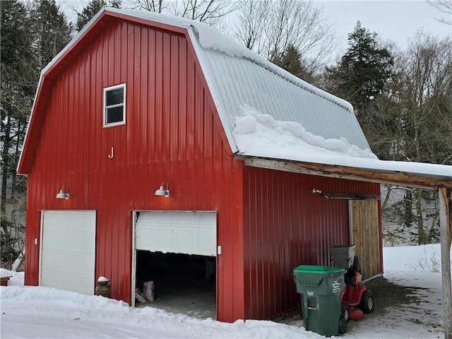 view of snow covered garage