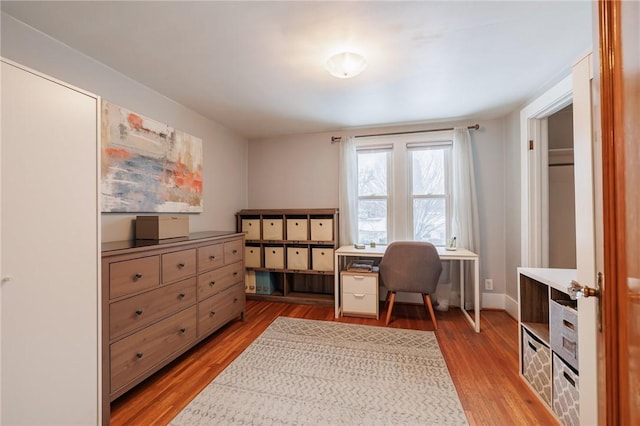 office space featuring light wood-type flooring