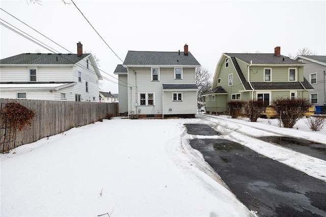 view of snow covered house