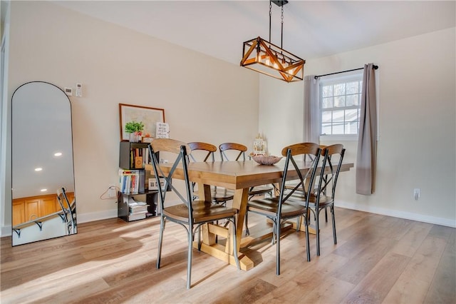 dining area with light wood-type flooring