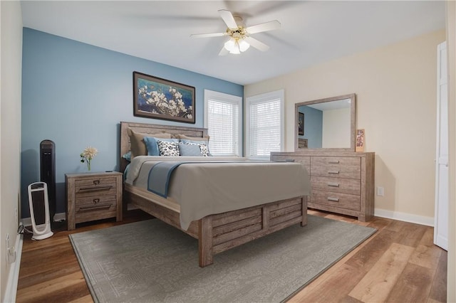 bedroom featuring ceiling fan and wood-type flooring