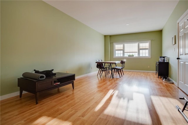 dining space featuring light wood-type flooring