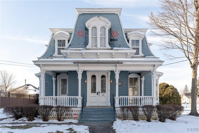 victorian-style house with a porch