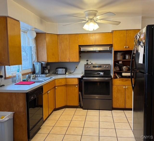 kitchen featuring light tile patterned flooring, sink, black appliances, ceiling fan, and exhaust hood