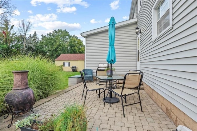 view of patio with a grill