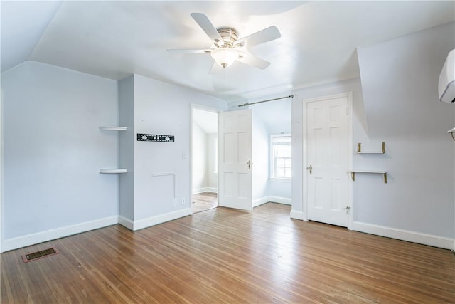 bonus room featuring ceiling fan, wood-type flooring, and vaulted ceiling