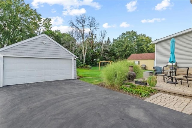 garage featuring a yard