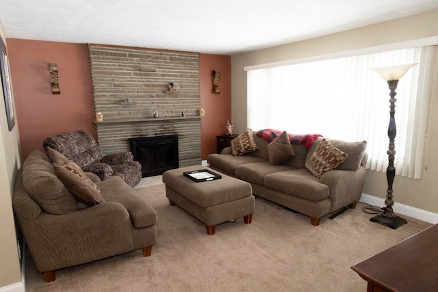 carpeted living room with a fireplace