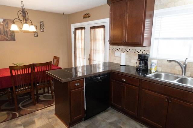 kitchen with pendant lighting, tasteful backsplash, dishwasher, sink, and kitchen peninsula