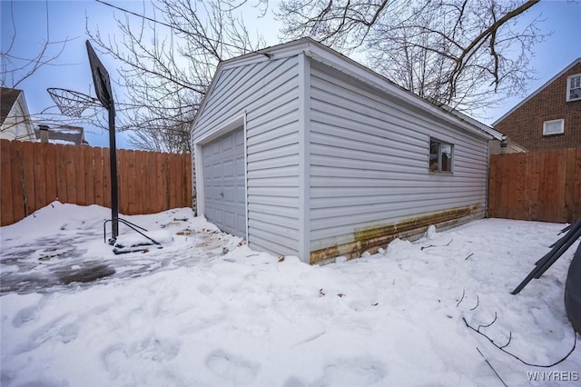 view of snow covered garage