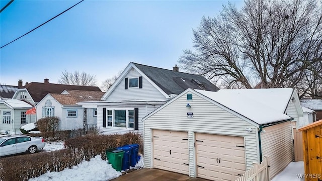 view of front of property with a garage