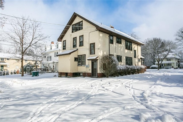 view of snow covered property