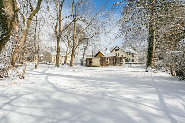 view of yard covered in snow