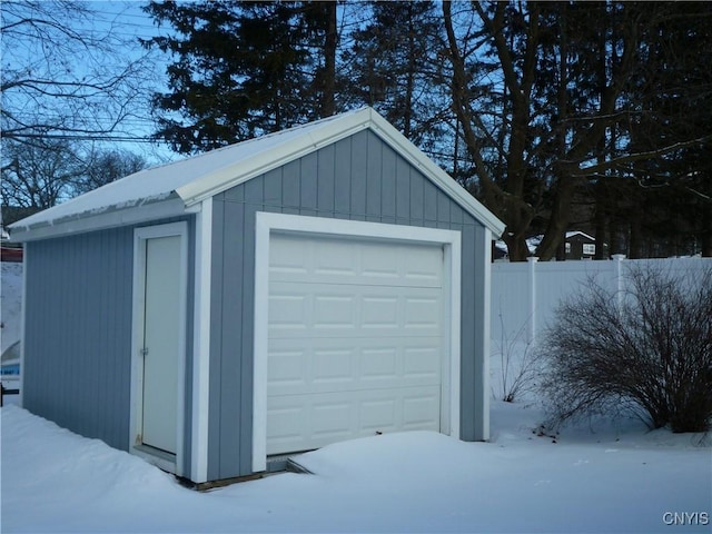 view of snow covered garage