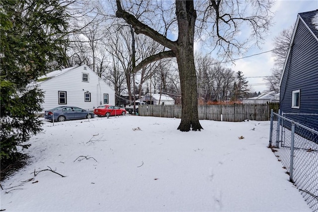 view of yard covered in snow