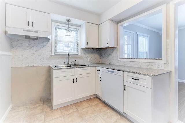 kitchen with tasteful backsplash, white cabinets, sink, and dishwasher