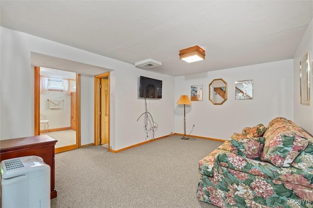 sitting room with carpet flooring