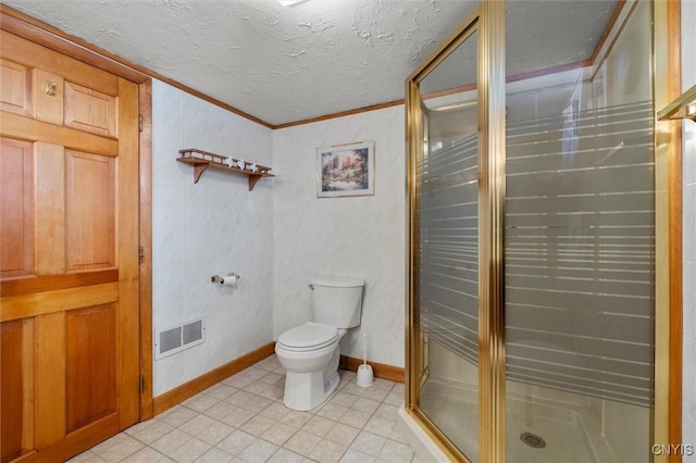 bathroom with toilet, ornamental molding, a textured ceiling, and walk in shower