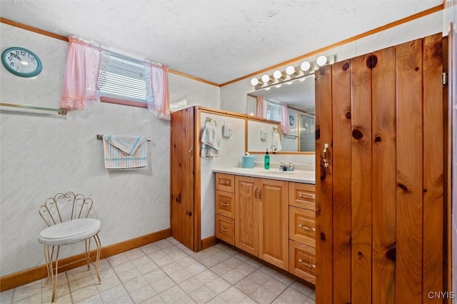 bathroom featuring vanity and a textured ceiling