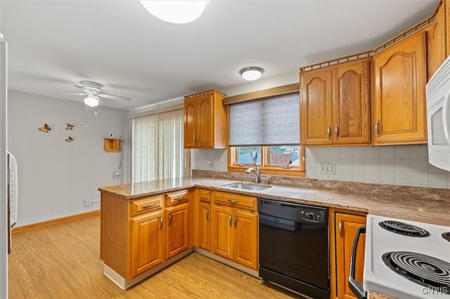 kitchen with black dishwasher, sink, light hardwood / wood-style floors, kitchen peninsula, and electric stove