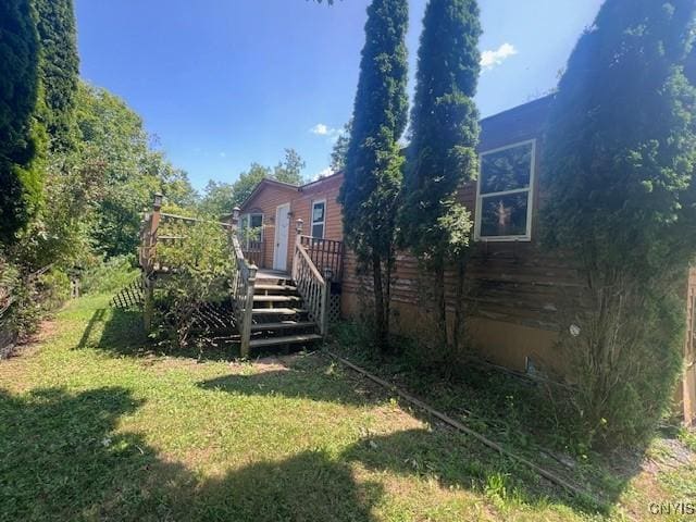 view of yard with a deck