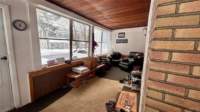 sunroom / solarium with wood ceiling