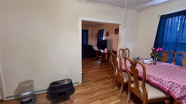 dining space featuring hardwood / wood-style floors