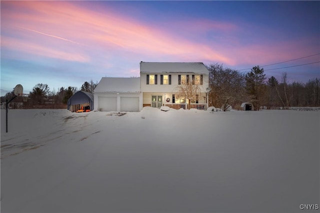 view of front of property with a garage