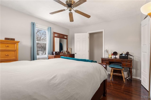 bedroom with ceiling fan and dark hardwood / wood-style flooring