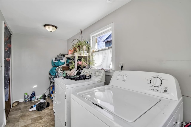 laundry area featuring washing machine and dryer