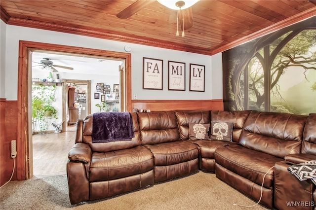 living room featuring ornamental molding, wooden ceiling, and ceiling fan