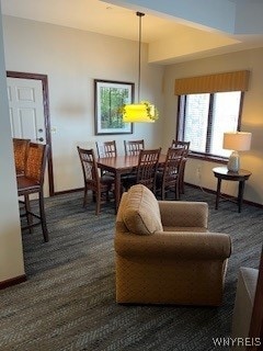 view of carpeted dining space