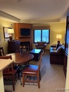 view of carpeted dining space