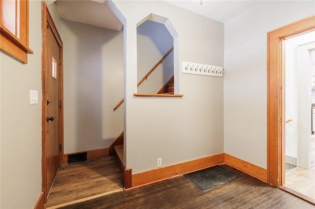 hall featuring dark hardwood / wood-style floors