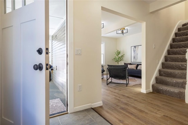 foyer entrance with hardwood / wood-style flooring