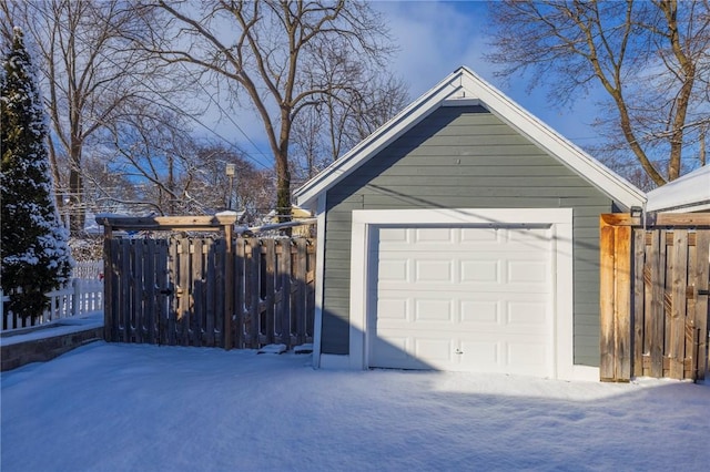 view of snow covered garage