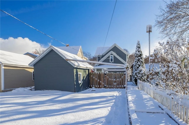 view of snow covered house