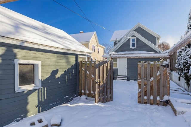 view of snow covered house