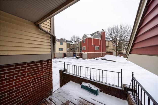 view of snow covered deck