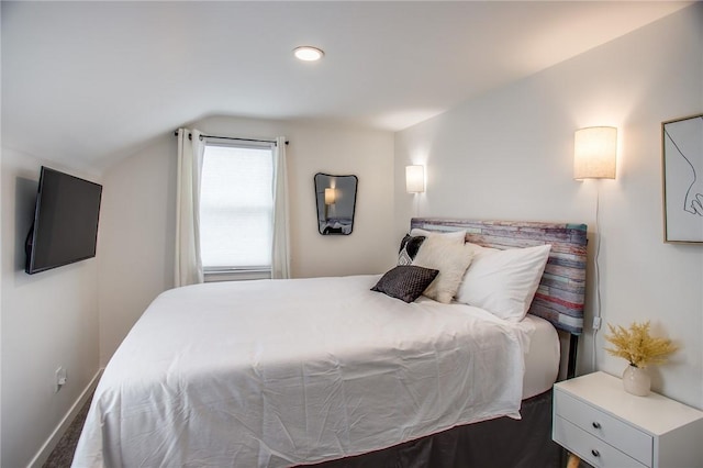 bedroom featuring vaulted ceiling