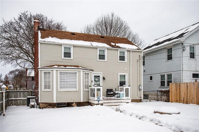 view of snow covered property