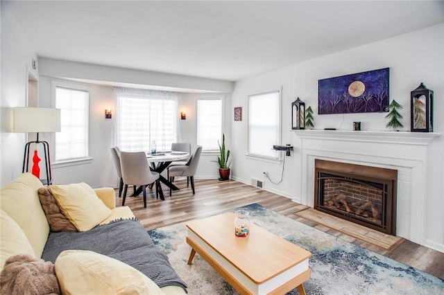 living room with light hardwood / wood-style floors