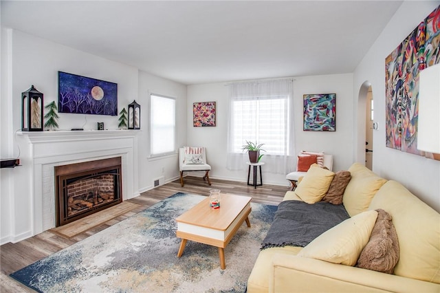 living room with light hardwood / wood-style flooring